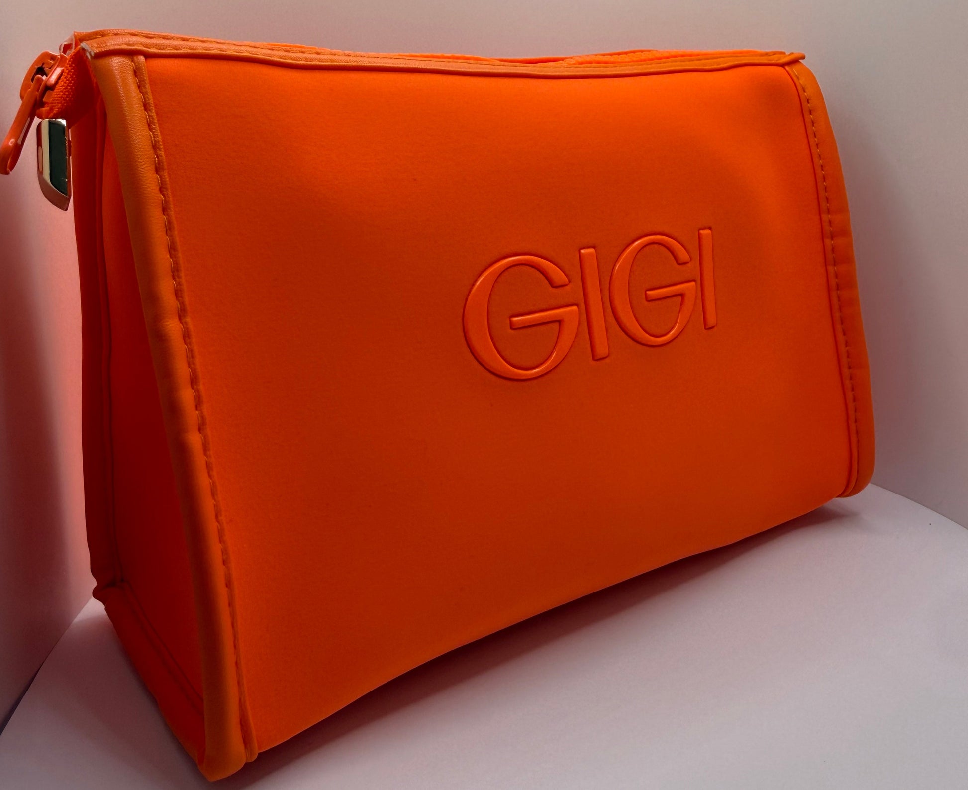 GIGI Travel Set arranged neatly with cosmetic bag for on-the-go skincare routine.