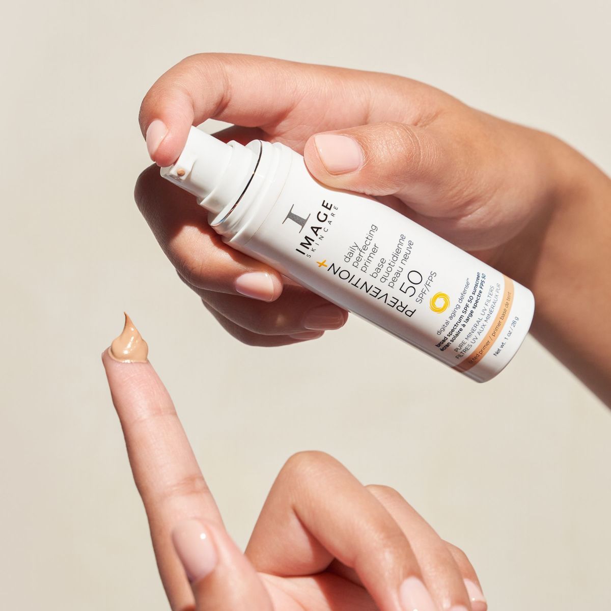 IMAGE PREVENTION+ daily perfecting primer sample on a finger