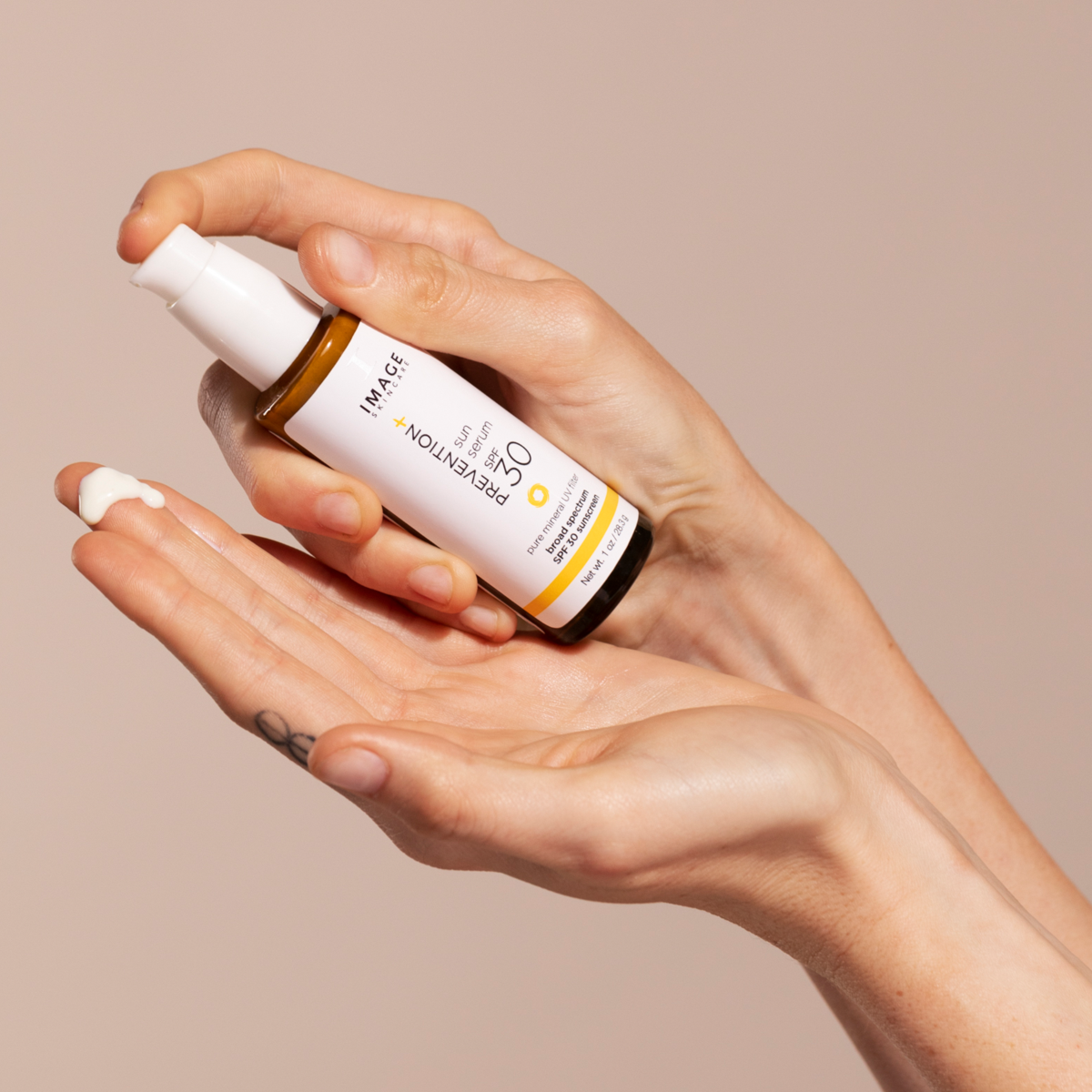 IMAGE SKincare PREVENTION+ sun serum sample on a finger