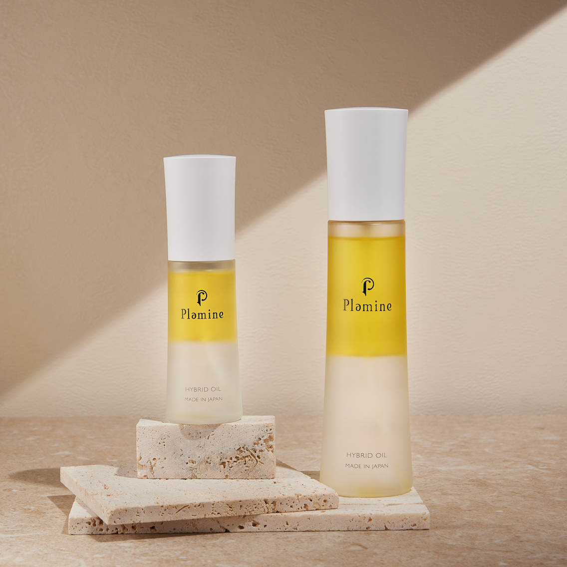 Plamine Hybrid Oil bi-phase face oil bottle on a plain background