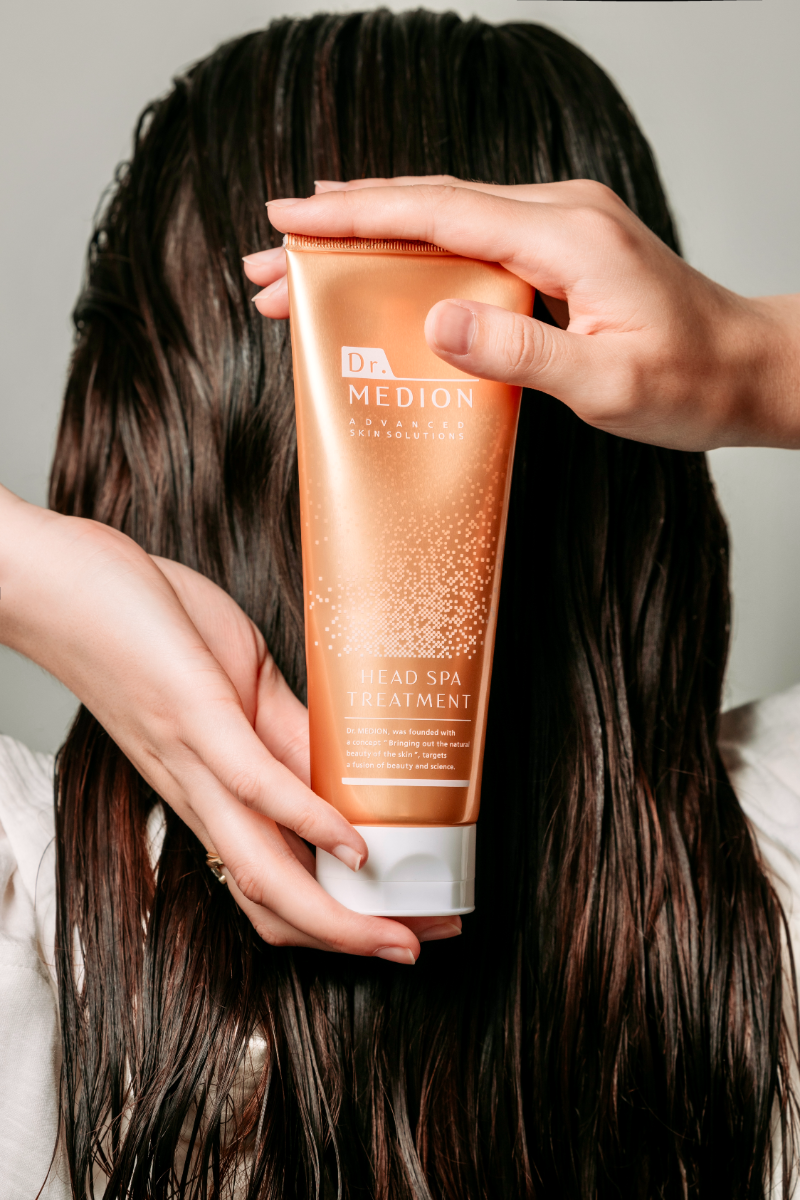 Close-up of Dr. Medion Head Spa Treatment showing creamy texture.