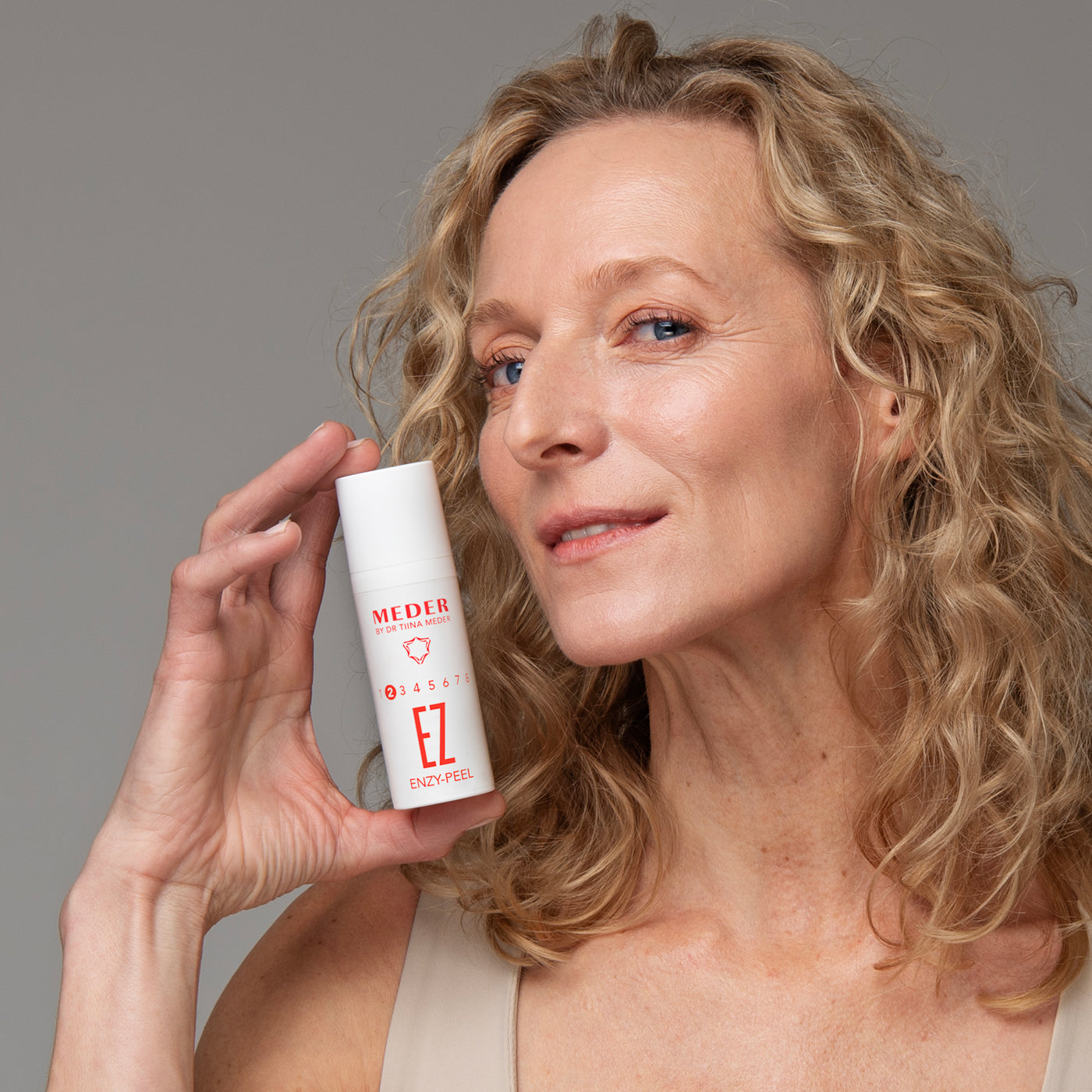 MEDER Enzy-Peel exfoliating mask bottle shown at an angle, label close-up